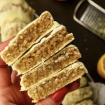 Close-up of lemon oatmeal no bake cookies showing their soft, chewy texture with visible oats and lemon zest