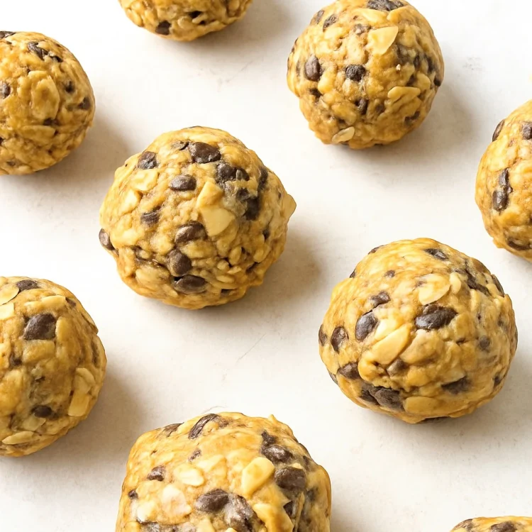 No bake coconut oatmeal energy bites arranged on a clean surface